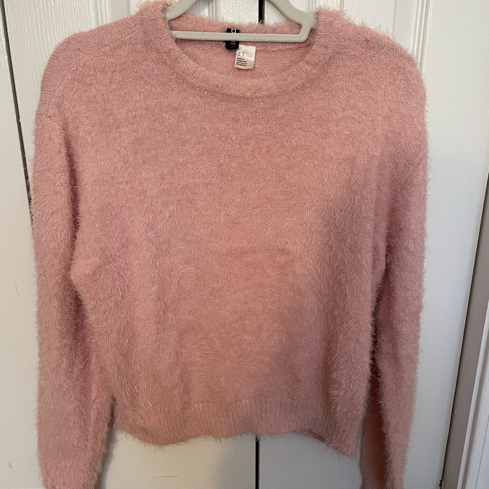 Divided pink sweater